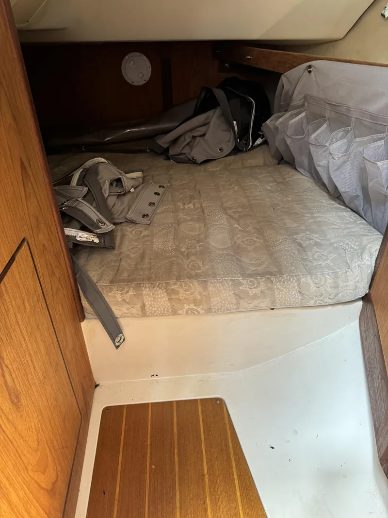 Slide: The Image of Interior of a 2000 Hunter 290 yacht with sleeping area. - 21