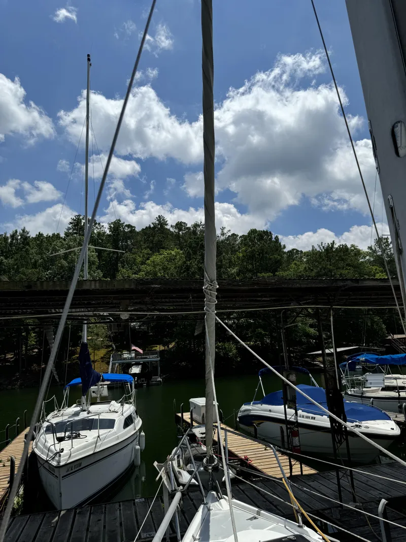 Slide: The Image of Sailboats docked under blue sky, Hunter 290, year 2000. - 45