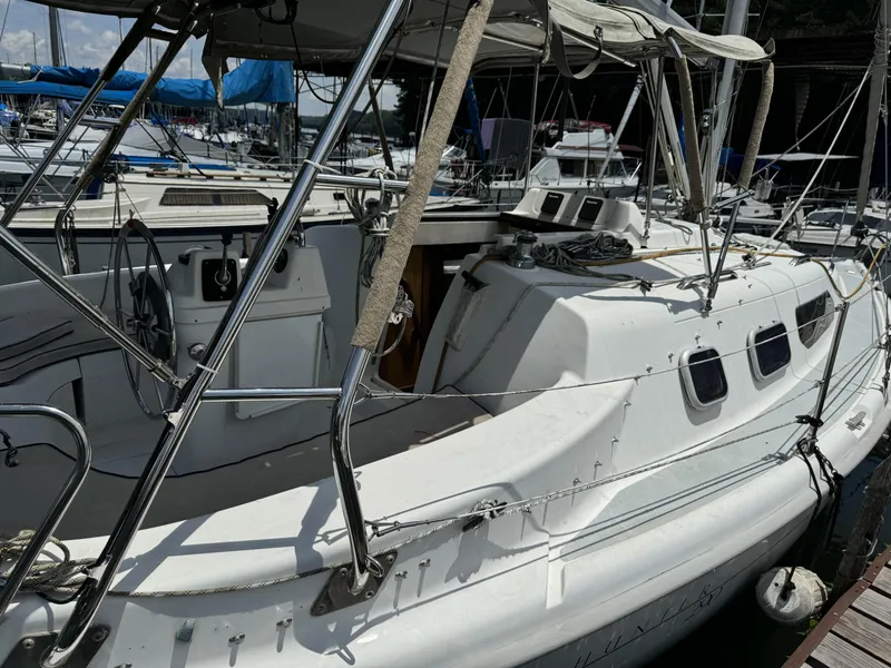 Slide: The Image of 2000 Hunter 290 sailboat docked at marina. - 9