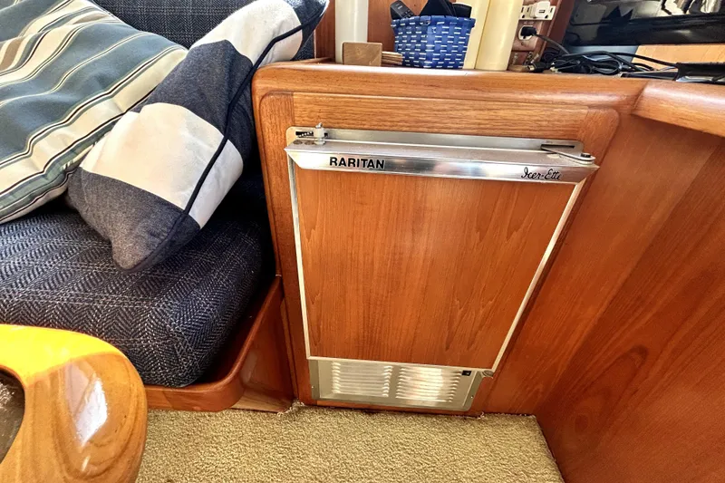 Slide: The Image of 1989 Ocean Alexander 44 CPMY interior with Raritan Icer-Ette ice maker and cushioned seating. - 23