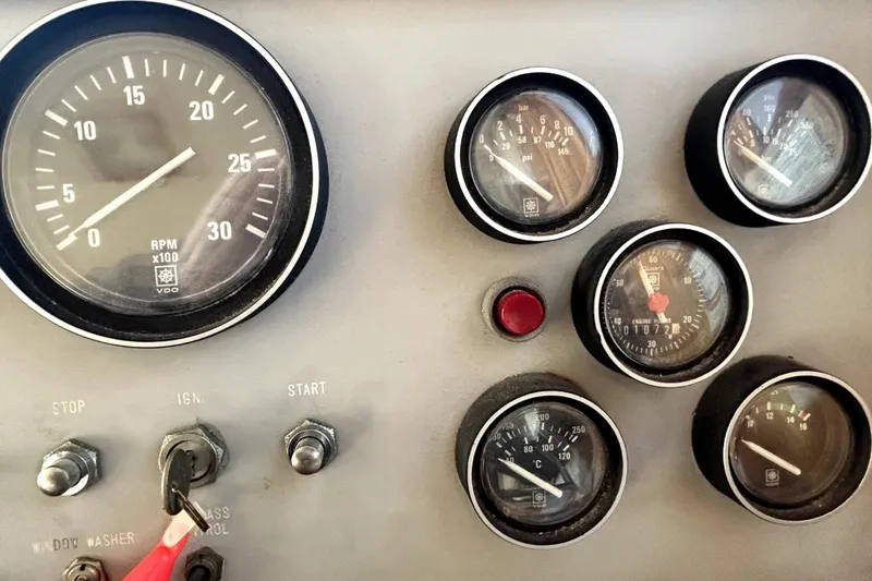 Slide: The Image of Dashboard of a 1989 Ocean Alexander 44 CPMY with various gauges and controls. - 35