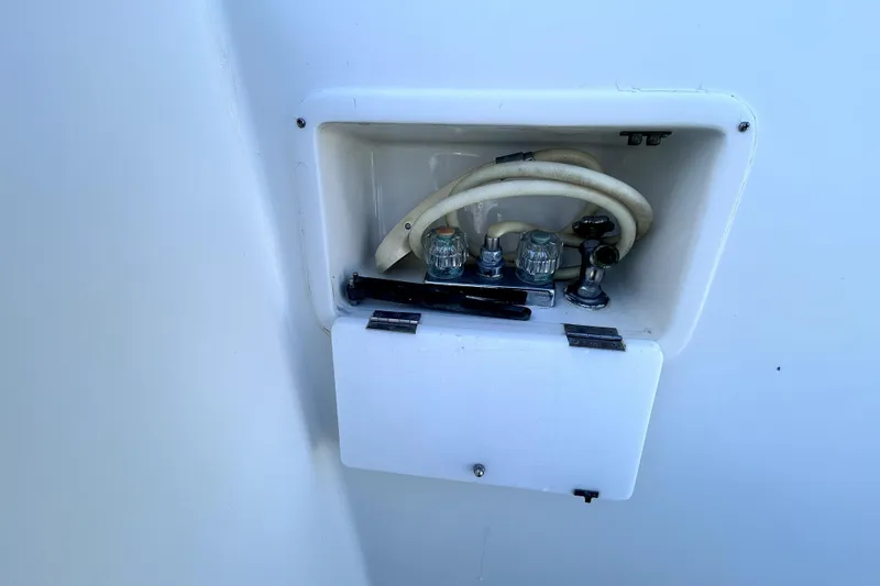 Slide: The Image of Water hose compartment on 1989 Ocean Alexander 44 CPMY yacht. - 39