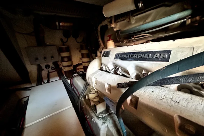 Slide: The Image of Engine room of 1989 Ocean Alexander 44 CPMY with Caterpillar engine. - 28