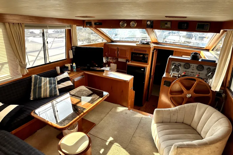 Slide: The Image of Luxurious 1989 Ocean Alexander 44 CPMY yacht interior with helm, seating, and panoramic windows. - 5