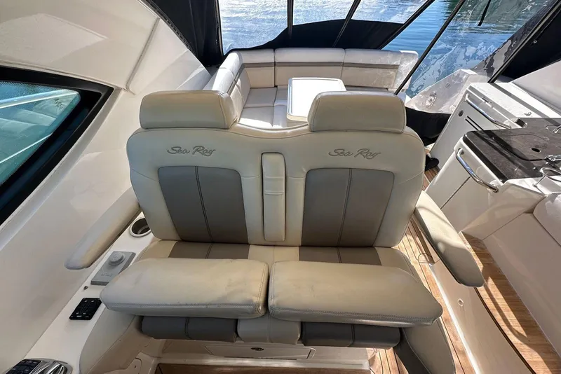 Slide: The Image of Luxurious interior of 2014 Sea Ray 410 Sundancer yacht with plush seating and elegant design. - 15