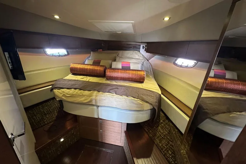Slide: The Image of Luxurious cabin interior of 2014 Sea Ray 410 Sundancer yacht with cozy bedding. - 38