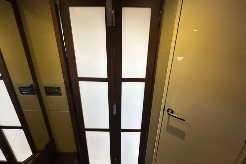 Slide: The Image of Interior door of a 2014 Sea Ray 410 Sundancer yacht, featuring modern design. - 44