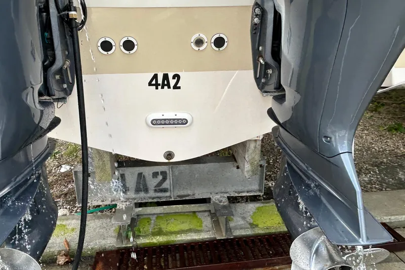 Slide: The Image of 2013 Grady-White Freedom 335 boat on dry dock, sunny day, clear sky. - 10