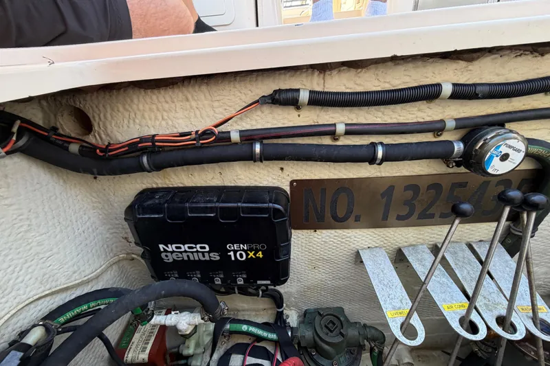 Slide: The Image of 2013 Grady-White Freedom 335 boat interior with seating and helm station. - 123