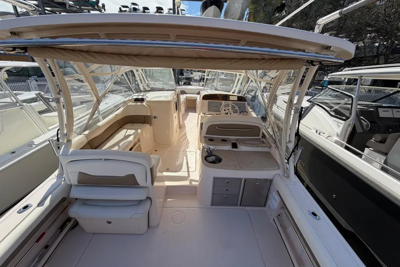 Slide: The Image of 2013 Grady-White Freedom 335 boat hull on wooden support. - 135