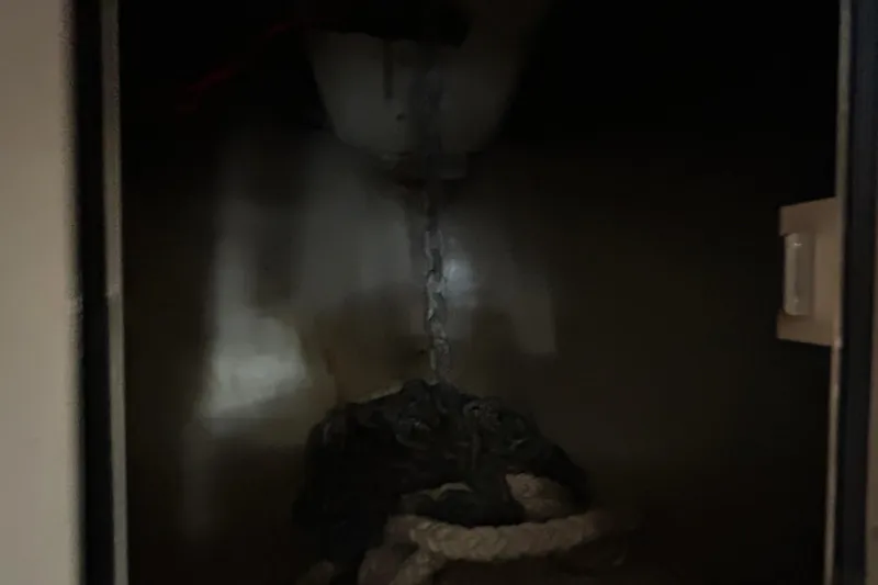 Slide: The Image of 2013 Grady-White Freedom 335 boat helm with steering wheel and control panel. - 39