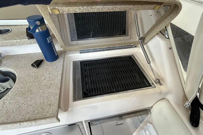 Slide: The Image of Grady-White Freedom 335 boat grill and countertop, 2013 model. - 43