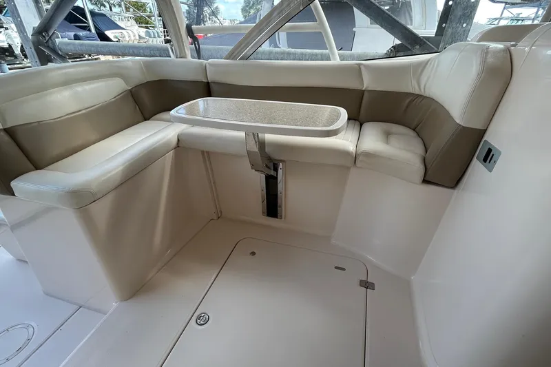 Slide: The Image of 2013 Grady-White Freedom 335 boat interior with seating and storage compartments. - 47