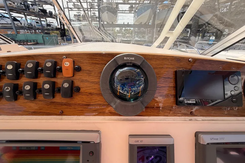 Slide: The Image of 2013 Grady-White Freedom 335 boat deck with seating and storage compartments. - 72