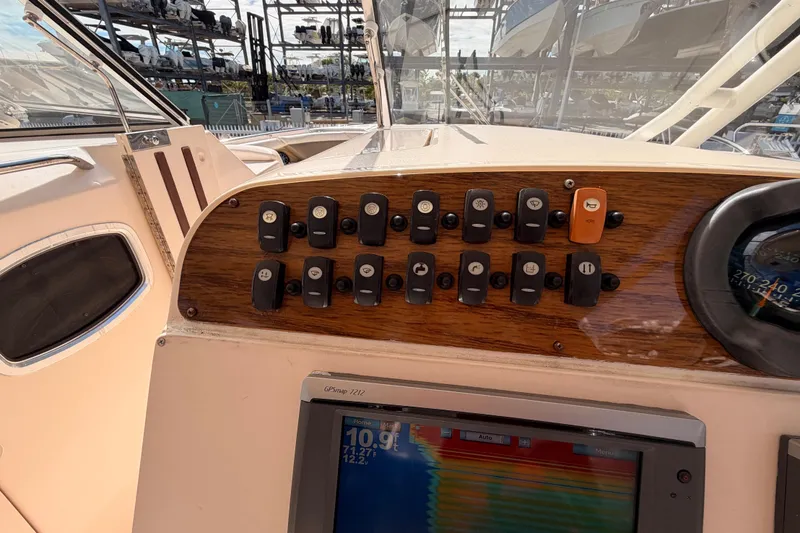 Slide: The Image of 2013 Grady-White Freedom 335 boat interior ceiling with skylights, docked at marina. - 73