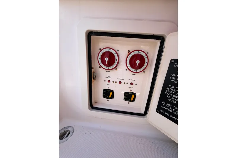 Slide: The Image of 2013 Grady-White Freedom 335 boat interior with white cushioned seating. - 83