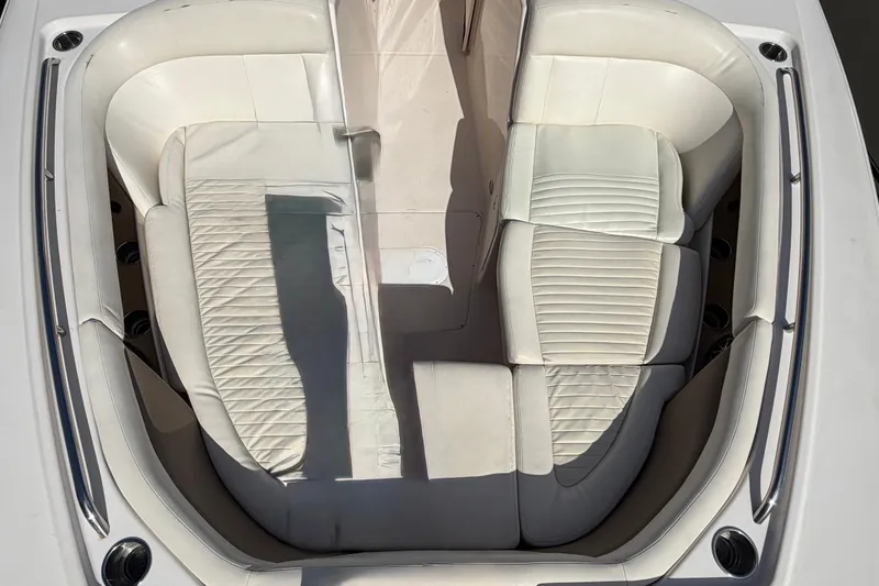 Slide: The Image of 2013 Grady-White Freedom 335 boat docked under clear blue sky. - 92