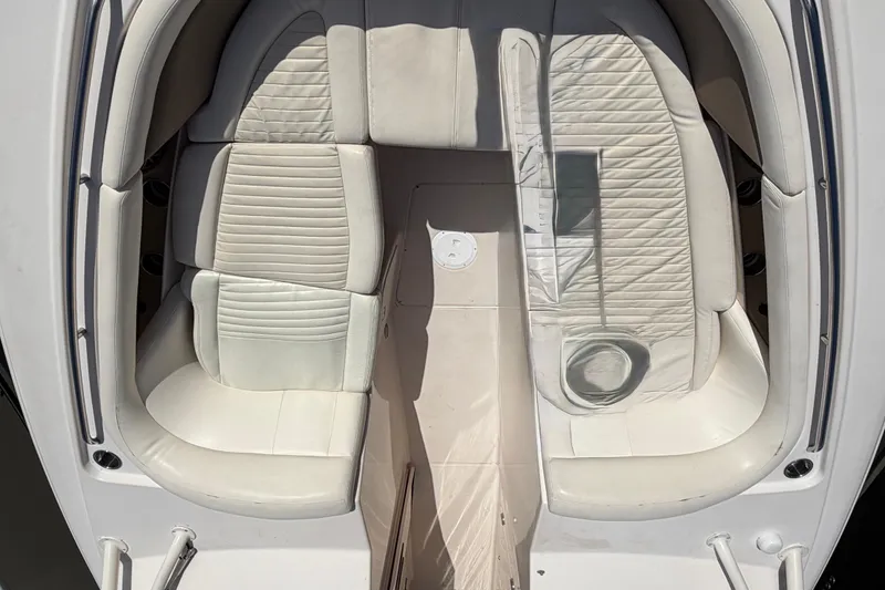 Slide: The Image of 2013 Grady-White Freedom 335 boat with luxurious white seating and speaker system. - 95