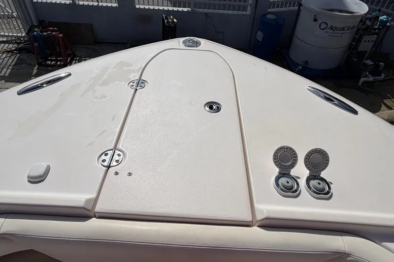 Slide: The Image of 2013 Grady-White Freedom 335 storage compartment with boating accessories. - 98