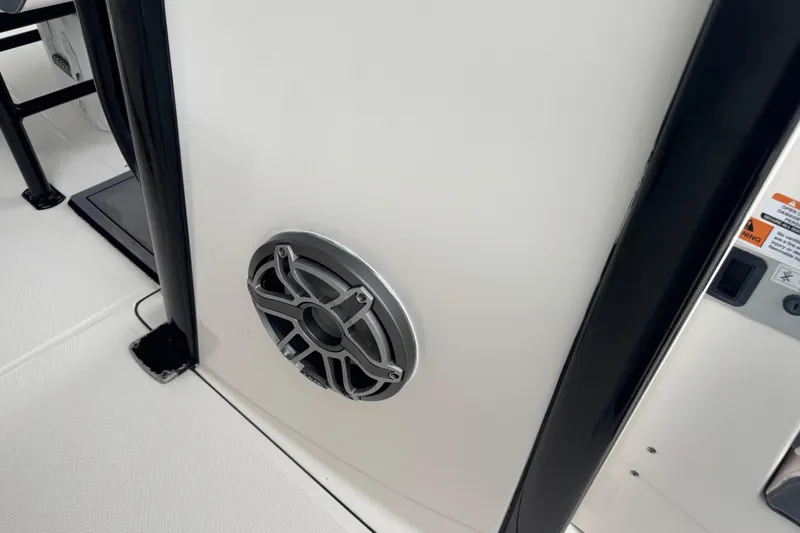 Slide: The Image of 2021 Robalo R230 Center Console speaker detail on white panel. - 14