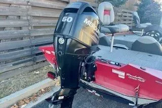 Slide: The Image of 2013 Tracker Pro Team 175 TXW boat with Mercury 60 outboard motor. - 14