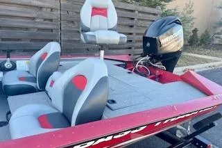 Slide: The Image of 2013 Tracker Pro Team 175 TXW boat with seating and Mercury outboard motor. - 5