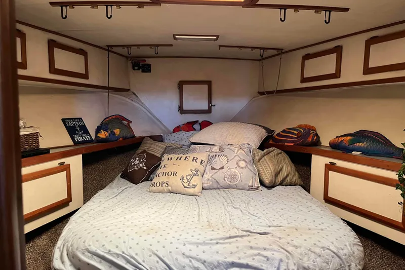 Slide: The Image of Cozy cabin interior of 1989 Topaz 44 Sportfisherman with nautical-themed decor. - 15