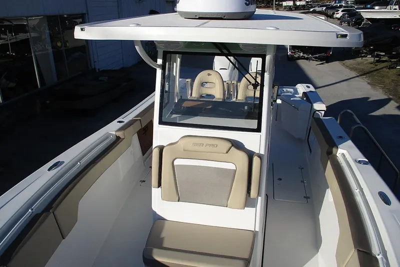 Slide: The Image of 2026 Sea Pro 292 Offshore boat with spacious seating and modern helm design. - 11