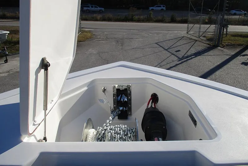 Slide: The Image of Anchor compartment of 2026 Sea Pro 292 Offshore boat with chain and winch. - 13