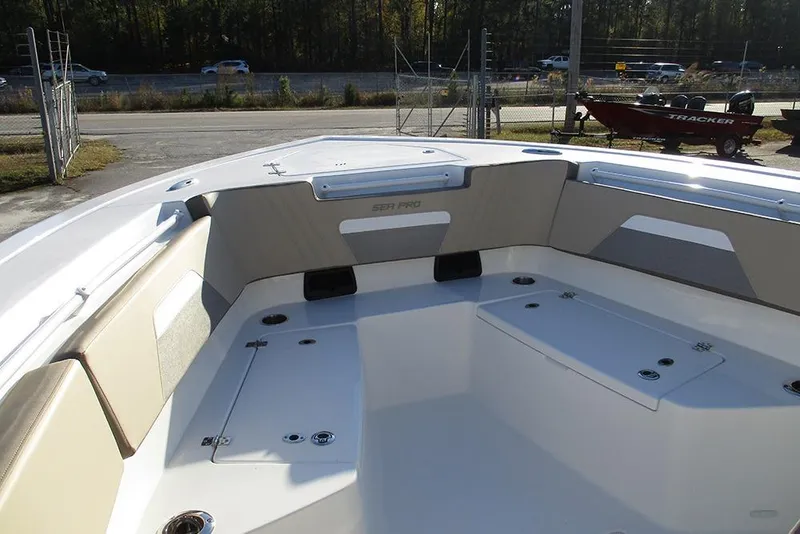 Slide: The Image of 2026 Sea Pro 292 Offshore boat interior with seating and storage compartments. - 15