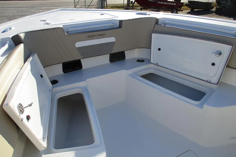 Slide: The Image of 2026 Sea Pro 292 Offshore boat interior with open storage compartments. - 18