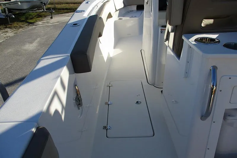 Slide: The Image of 2026 Sea Pro 292 Offshore boat interior with sleek white deck and seating. - 24
