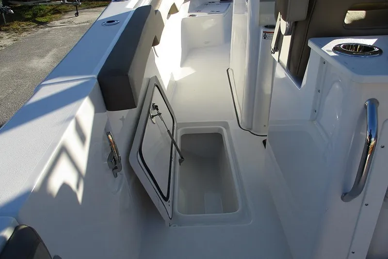 Slide: The Image of 2026 Sea Pro 292 Offshore boat interior with open storage compartment. - 25