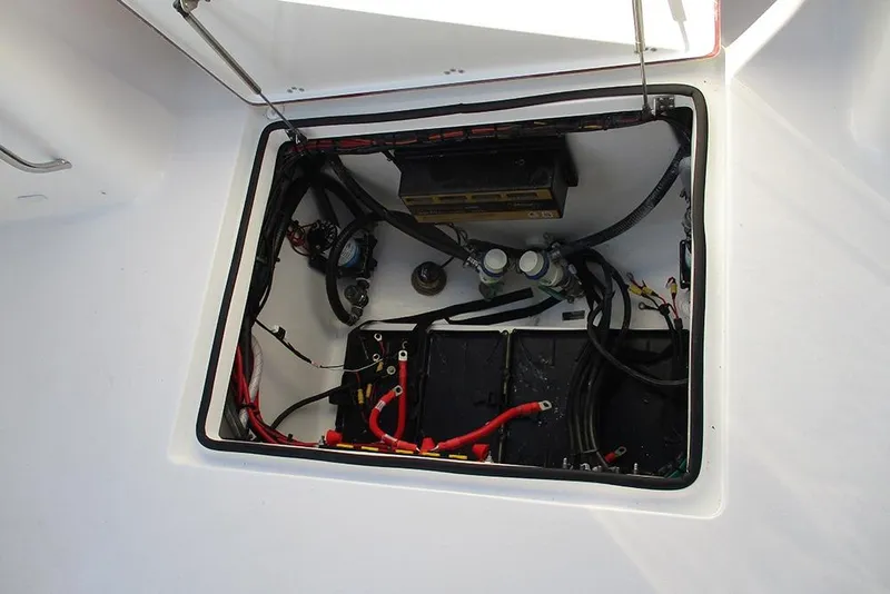 Slide: The Image of 2026 Sea Pro 292 Offshore boat electrical compartment with wiring and components. - 33