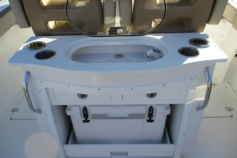 Slide: The Image of 2026 Sea Pro 292 Offshore boat interior with sink and storage compartments. - 41