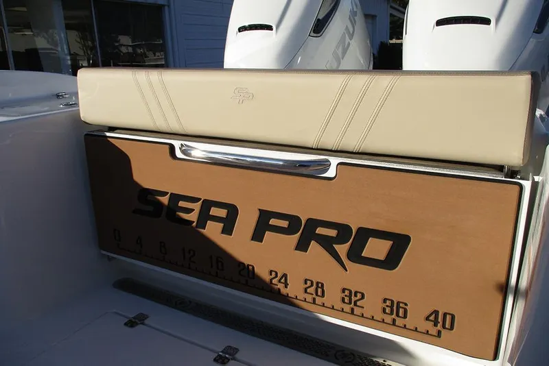 Slide: The Image of 2026 Sea Pro 292 Offshore boat with branded seat and measurement board. - 44