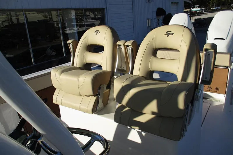 Slide: The Image of 2026 Sea Pro 292 Offshore boat seats, beige leather, with armrests and logo. - 46