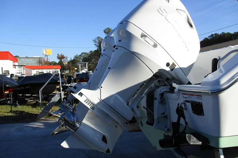 Slide: The Image of 2026 Sea Pro 292 Offshore boat engine in a dealership lot. - 9