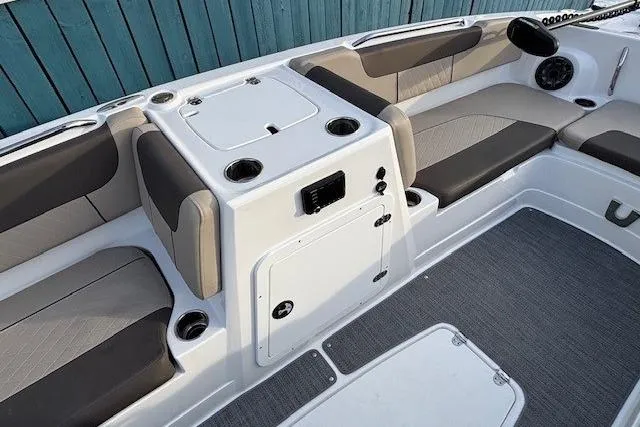Slide: The Image of Interior of 2025 Tahoe 2150 boat with seating and storage compartments. - 12