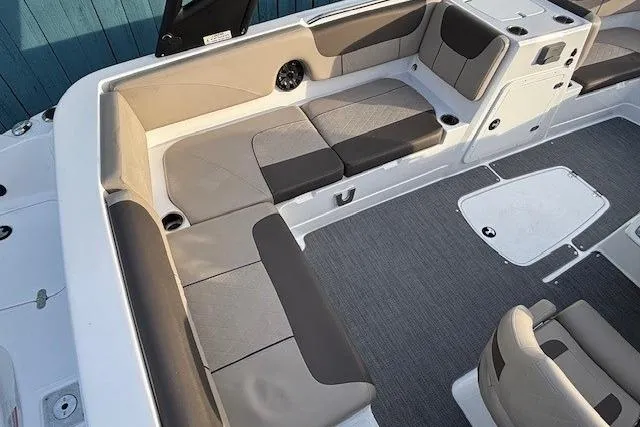 Slide: The Image of 2025 Tahoe 2150 boat interior with spacious seating and modern design. - 27