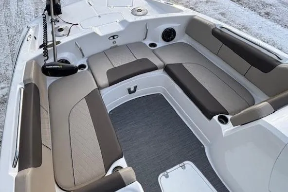 Slide: The Image of 2025 Tahoe 2150 boat interior with spacious seating and modern design. - 7