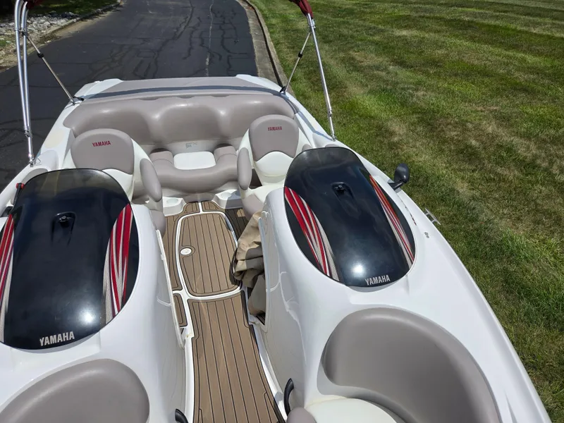 Slide: The Image of 2001 Yamaha LS 2000 boat interior with seating and sleek design. - 18