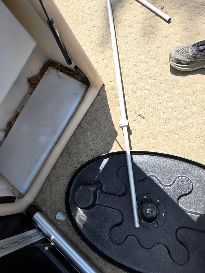 Slide: The Image of Boat interior with a broken pole and base, South Bay 522 E, 2014 model. - 23