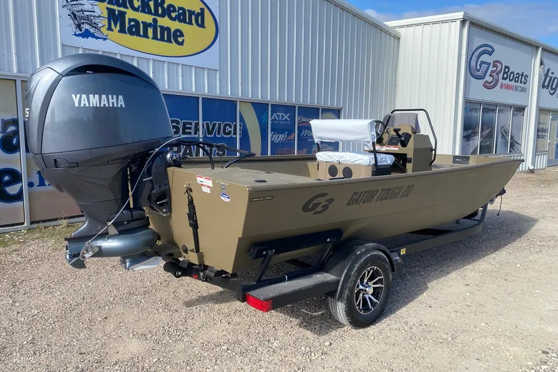 Slide: The Image of 2026 G3 Gator Tough 20 CCJ boat with Yamaha engine at dealership. - 6
