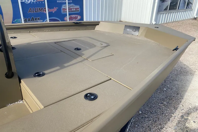 Slide: The Image of 2026 G3 Gator Tough 20 CCJ boat deck, featuring storage compartments and durable design. - 9