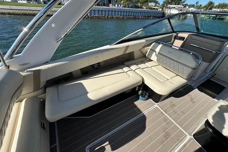 Slide: The Image of Luxurious interior of 2019 Regal 29 OBX boat with beige seating and sleek design. - 35