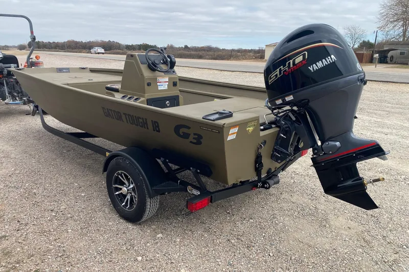 Slide: The Image of 2026 G3 Gator Tough 18 CC boat with Yamaha outboard motor on trailer. - 4