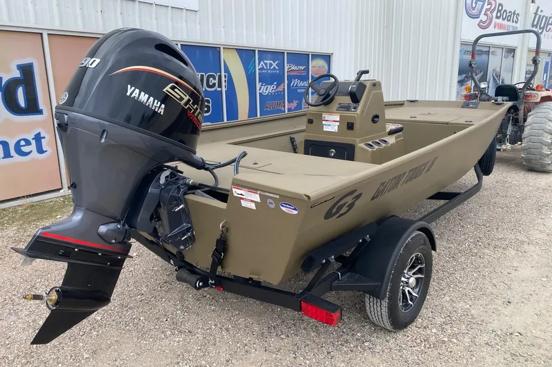 Slide: The Image of 2026 G3 Gator Tough 18 CC boat with Yamaha engine on trailer. - 6