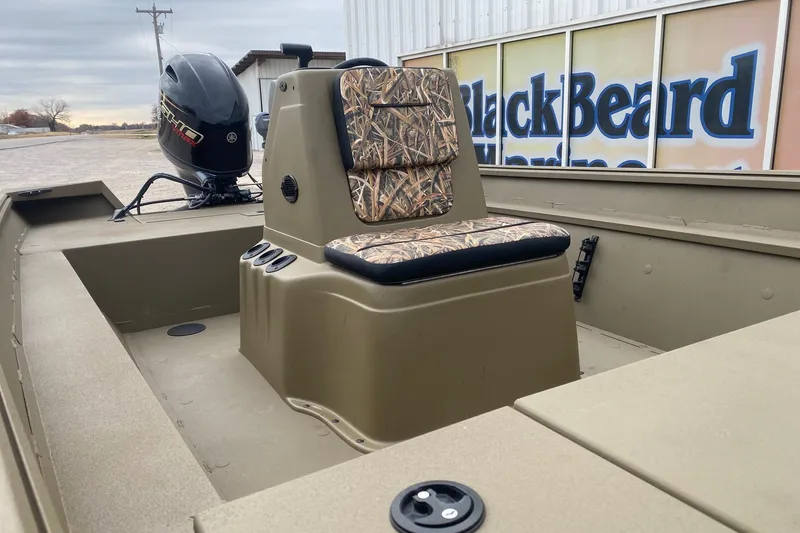 Slide: The Image of 2026 G3 Gator Tough 18 CC boat with camo seating and Yamaha outboard motor. - 8