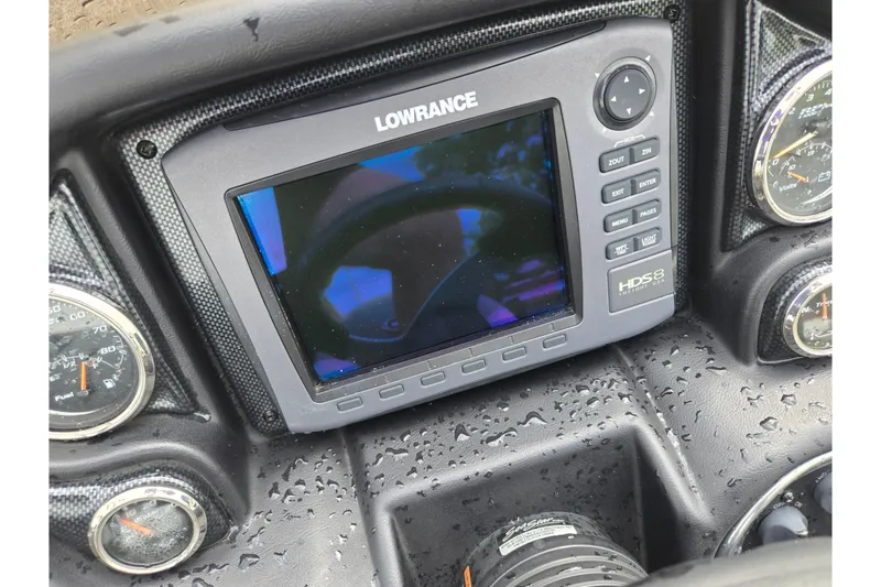 Slide: The Image of Lowrance HDS-8 display on 2014 Triton 19XS dashboard with raindrops. - 14